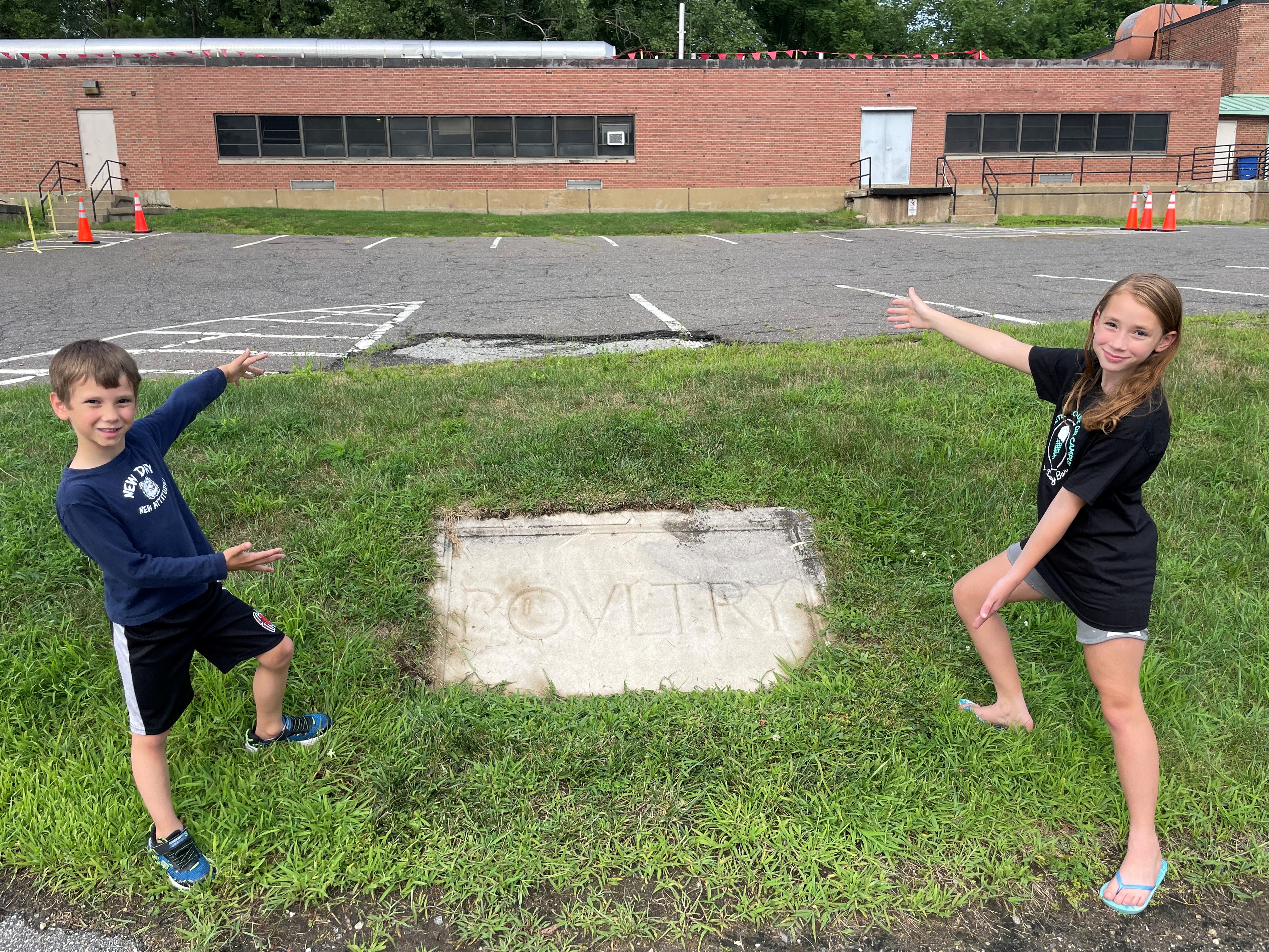 kids showing off poultry plaque