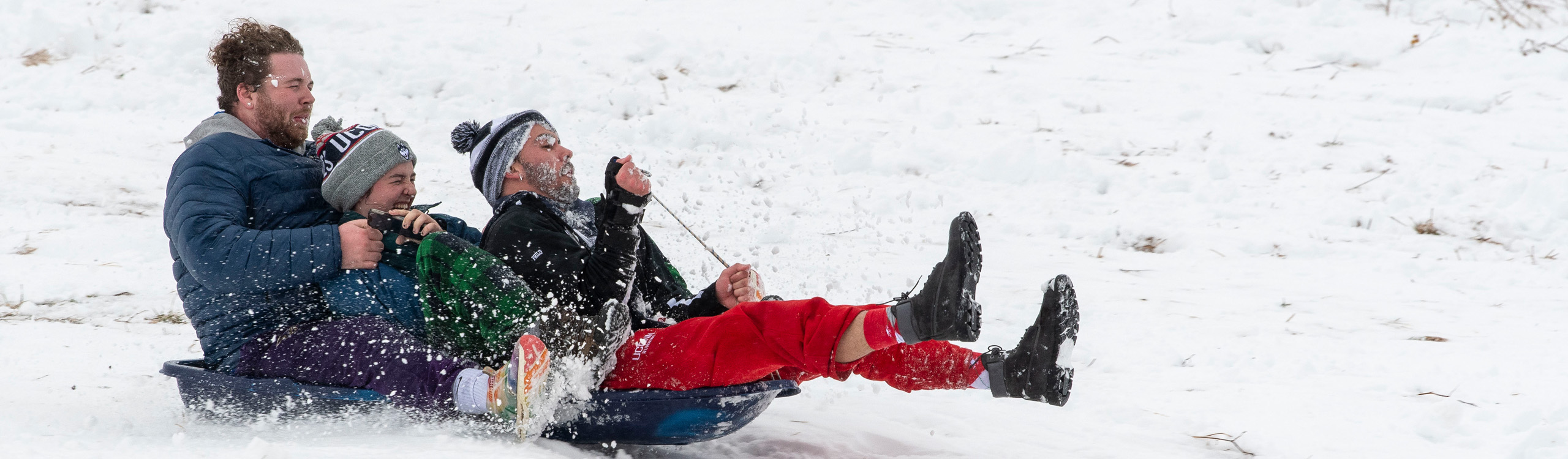 students sledding